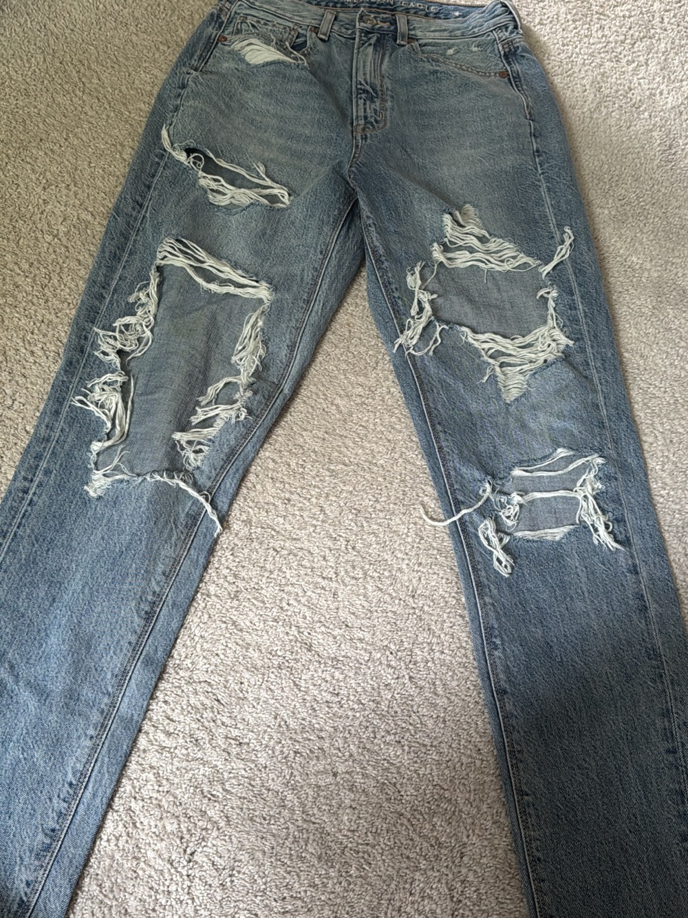 American Eagle Outfitters High-Rise Distressed Light Blue Jeans